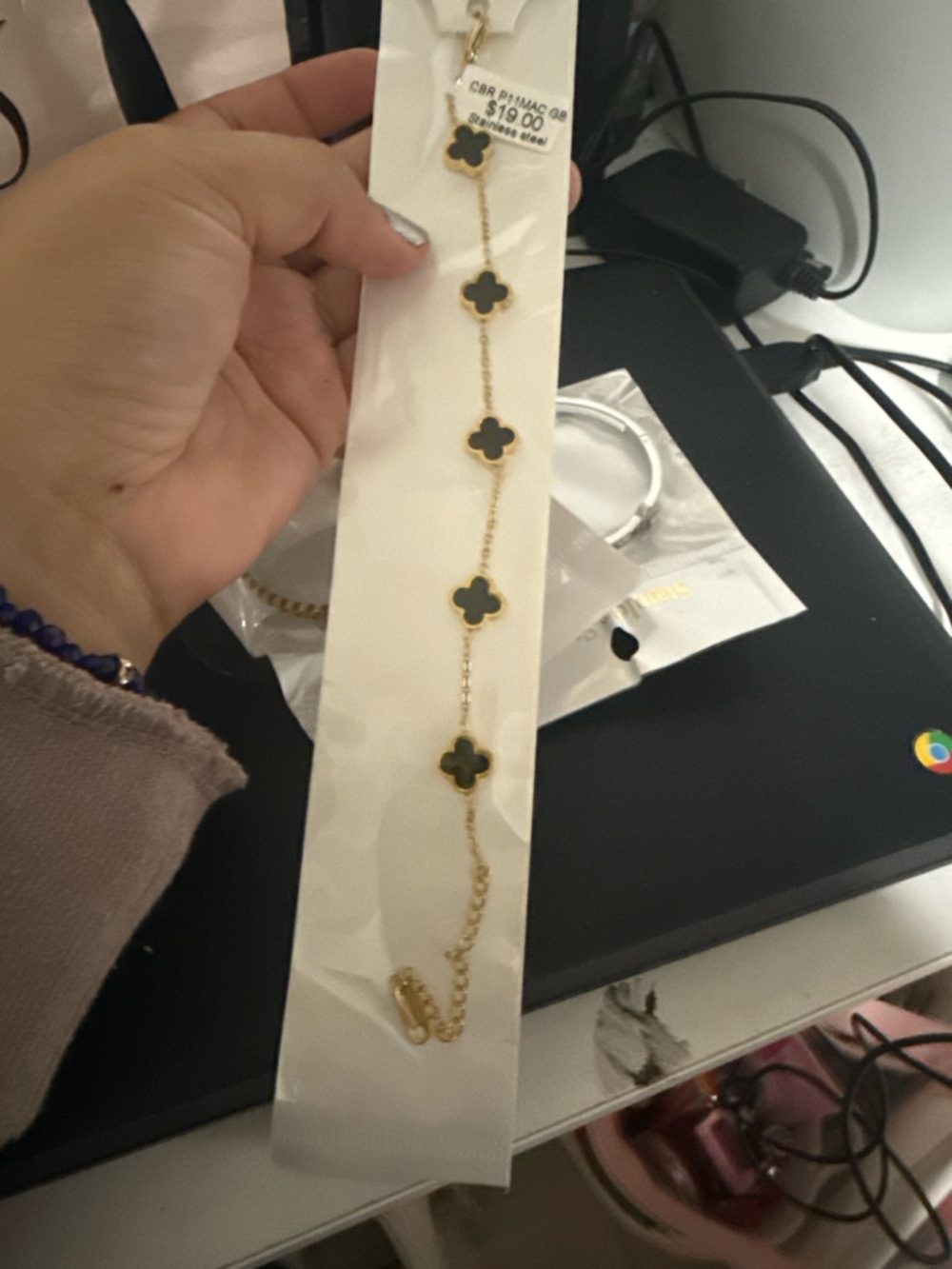 Gold Chain Bracelet with Black Clover Accents